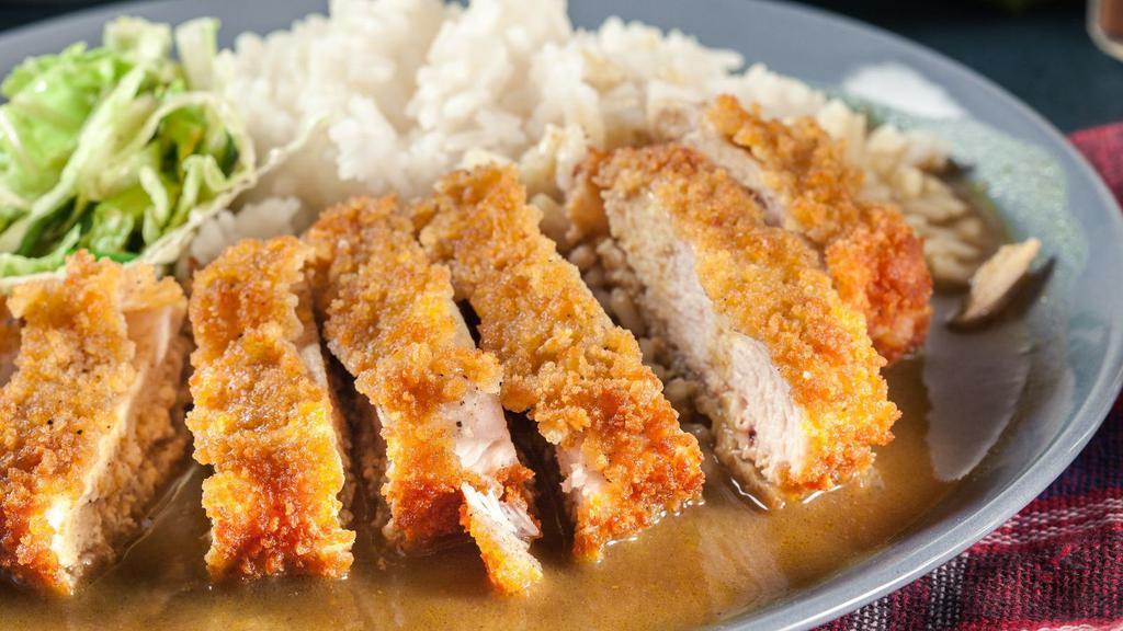 The Chicken Katsu With Curry
Bowl · A thick curry sauce served with crispy, fried chicken cutlet on a bed of white steamed rice.