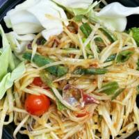 Somtum Lao (Laotian Papaya Salad) · Laotian & North-Eastern Thai style salad; made with shredded green papaya, tomato, string be...