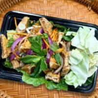 Larb Tofu (Vegan)(Gf) · Flavorful sour-and-spicy salad, widely served in Laos and Thailand, and better if pair with ...