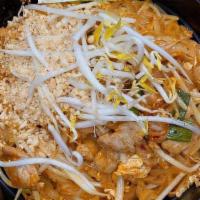 Pad Thai · Stir-fried thin rice noodle that its flavor is centered around a sweet-savory fusion. Cooked...