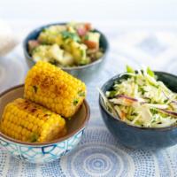 Cilantro Lime Corn On The Cob · Vegetarian. Fresh corn topped with cilantro-lime butter and chile.