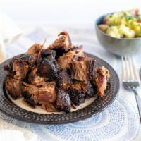 Beef Brisket · 1/2 lb. a chunk of beef that is cooked by smoke for hours at a low temperature that comes ou...