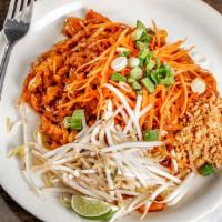 Pad Thai · Rice noodles stir fried with egg, bean sprouts, green onions, and ground peanuts.
