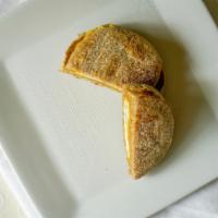 Breakfast Sandwich · Egg & cheddar or vegan tofu scramble on english muffin or bagel.
