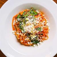 Pomodoro (Vegetarian) · Plum tomatoes sauce, baby spinach, topped with Sardinian salted ricotta.