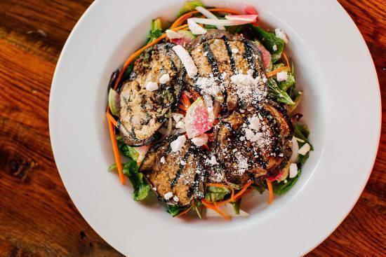 Marinated Eggplant Salad · Grilled eggplants marinated in a balsamic vinaigrette on a mixed green salad with watermelon radish, carrot and onion. Topped with smoked ricotta and a balsamic dressing.