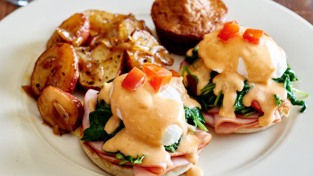 Tavern Benedict · Virginia cured ham or sliced grilled chicken breast, sautéed fresh spinach, diced Roma tomatoes, poached eggs. English muffins, choice of Hollandaise.                                                                                                              
                                                                                                                                                                 
Consuming raw or undercooked meats, poultry, seafood, shellfish, or eggs may increase your risk of food-borne illness.