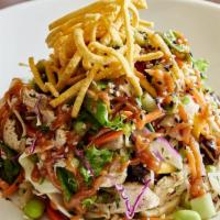Thai Chicken · mixed greens and cabbages, cucumbers, edamame fried wontons, Lime Cilantro dressing, drizzle...