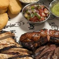 Parrilla For 2 · Grilled chicken breast  + grilled top sirloin + pico de gallo  + chorizo 

Sides:
- Yucca
- ...