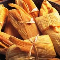 Tamale Plate · Seasoned meat with red Chile rolled in corn meal dough, wrapped in corn husks and steamed. S...