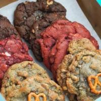 One Dozen Large Cookies · 1/5 lb per cookie,  up-to three flavors.