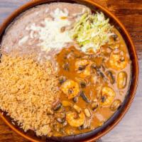 Camarones Chipotle · Sautéed prawns with garlic, mushrooms, and covered with chipotle sauce. Dos Amigos 21.25 For...