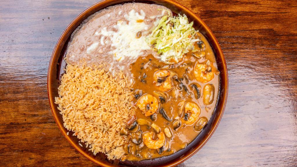 Camarones Chipotle · Sautéed prawns with garlic, mushrooms, and covered with chipotle sauce. Dos Amigos 21.25 For the seafood Lovers. Sautéed scallops, shrimp, and s mushroom covered with a la diabla hot sauce.