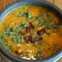 Yellow Daal Tadka · Gluten free. Vegan. Spicy. Yellow lentils, onion, tomato, cilantro, indian spices.