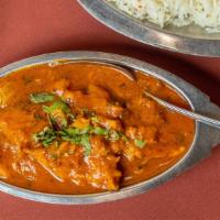 Murg Mirch Masala · A very hot and spicy chicken curry sauteed with potatoes and chillies. Only for the brave at...