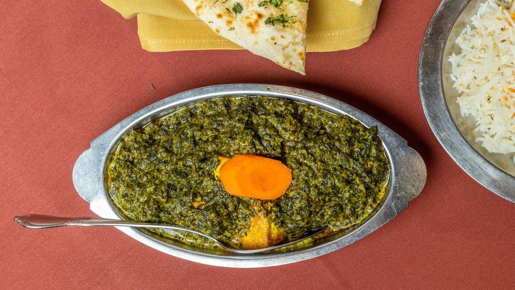 Saag Paneer · Homemade cheese and spinach sauteed with a touch of cream.