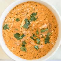 Paneer Makhani Masala · Homemade cheese cooked in a spicy tomato sauce with a touch of cream. A divine buttery taste!.
