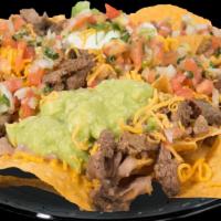 Nachos · Your choice of protein. Comes with beans and cheese on top of chips. Guacamole, sour cream, ...
