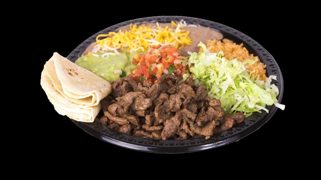 Carne Asada Plate Combo · Steak meat, pico de gallo, guacamole, and lettuce. Rice and beans with cheese on the side. Comes with tortillas.