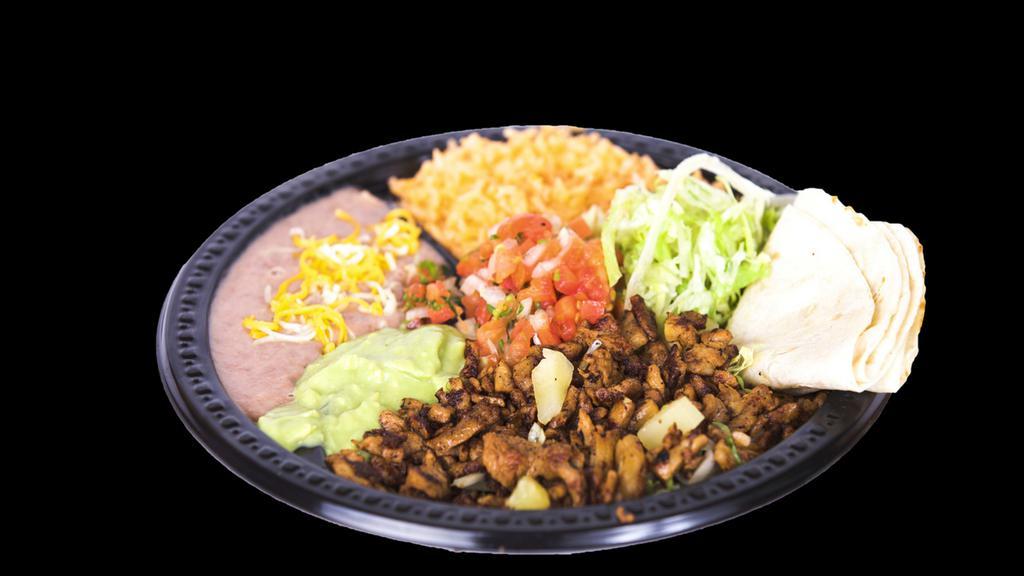 Adobada Plate Combo · Marinated pork, pico de gallo, guacamole, sour cream, lettuce, rice and beans with cheese on the side. Comes with tortillas.