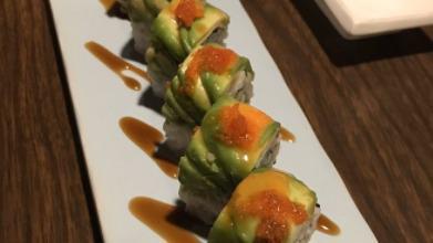 Dragon Roll · Shrimp tempura roll topped with avocado, eel sauce, spicy mayo.