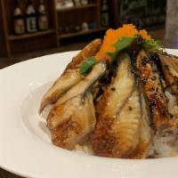 Unagi Don · Bbq eel over rice served with miso soup.