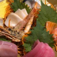 Sashimi Deluxe · Tuna, salmon, white fish, ama ebi, hotate, saba.