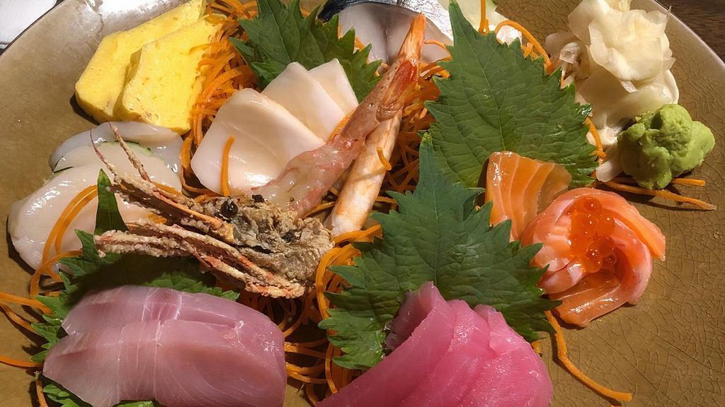 Sashimi Deluxe · Tuna, salmon, white fish, ama ebi, hotate, saba.