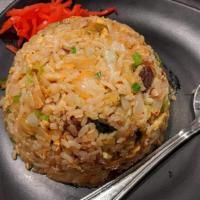 Kimchi Fried Rice · Kimchi, onions, egg, green onions and chopped chashu pork with rice.