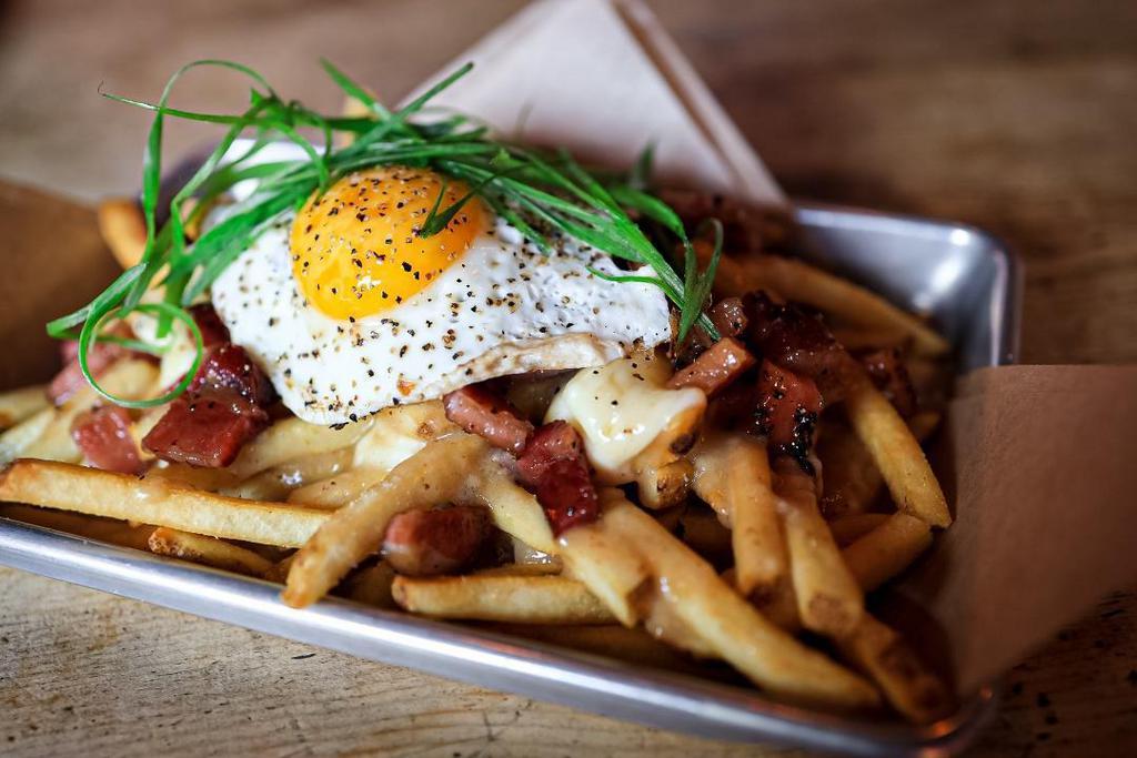 E.C. Poutine · fried egg, maple-black pepper bacon, cheese curds, brown gravy, green onions