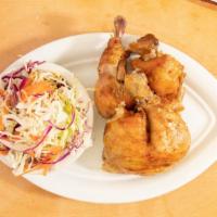 1/2 Chicken · Huhner and brotchen. Includes a roll and choice of one side dish.