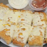 Cheese Breadsticks · 5 breadsticks with melted mozzarella, seasoned with parmesan, garlic, and oregano.
