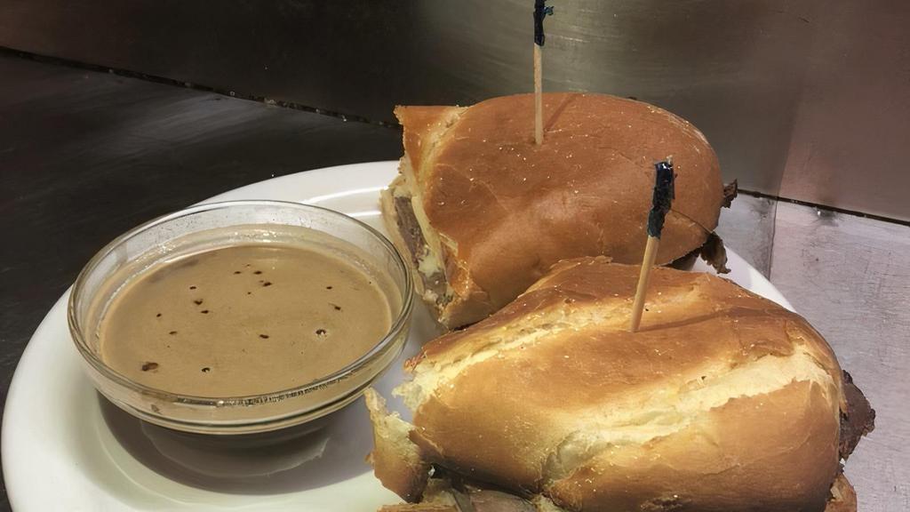 Kelli'S French Dip · Toasted sandwich with roast beef and side of Au jus dipping sauce.
