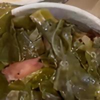 Collard Greens  · Homemade Collard Greens with smoked turkey slow cooked for 10 hours