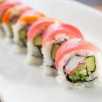 Rainbow Roll · Inside out rolled filled with creamy avocado, cucumber and loads of kani (imitation crab) an...