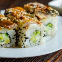Arizona Roll · Inside out roll filled with fresh salmon, wrapped with sushi rice and nori (seaweed) and top...