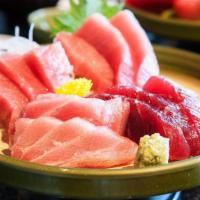 Sashimi Combo · Fresh, thinly sliced tuna and salmon. Soy sauce, ginger and wasabi on the side.