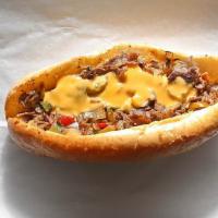 Cheesesteak · Thinly sliced grilled steak or chicken served in a fresh baked roll with choice of melted ch...