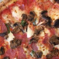 The Duke · Margherita with salami, oven roasted mushrooms, and garlic.
