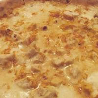 Buffalo Chicken Pizza · Roasted chicken, fresh mozzarella, buffalo sauce, ranch dressing.