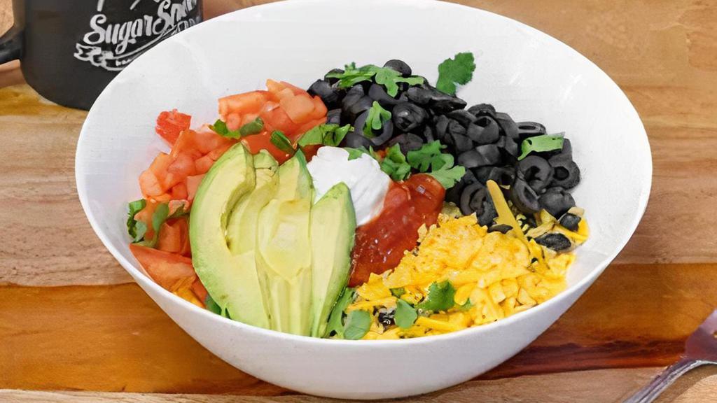 Savory Bowl · Savory sauce, rice, beans, shredded cheese, olives, tomatoes, sour cream, salsa, and avocado topped with cilantro