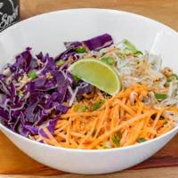 Thai Bowl · Thai sauce, rice, beans, shredded carrots, red cabbage, bean sprouts, lime wedge, topped wit...
