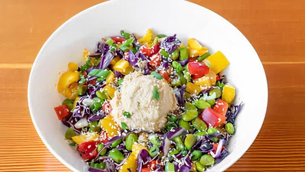 Ginger Asian Bowl · Ginger Asian sauce, rice, beans edamame, red cabbage, grilled peppers, topped with sesame seeds, green onions, and a dollop of hummus.