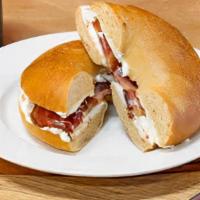 Breakfast Bagel · Fresh bagel of your choice toasted with your choice of ham, bacon sausage, or veggie sausage...