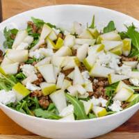 Pear Arugula Salad · Fresh Arugula topped with sliced pear, candied pecans, blue cheese crumbles and balsamic vin...