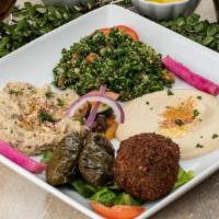 Vegetarian Platter · Hummus, baba ghanouj, tabouli, 2 falafels, 2 dolmas, and 2 pitas.