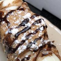 Cannoli · Chocolate Chip Creme Filling, Chocolate Drizzle & Powdered Sugar on Top