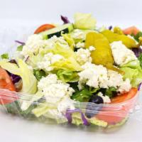 Greek · Greek salads include feta cheese, kalamata olives and pepperoncinis.
