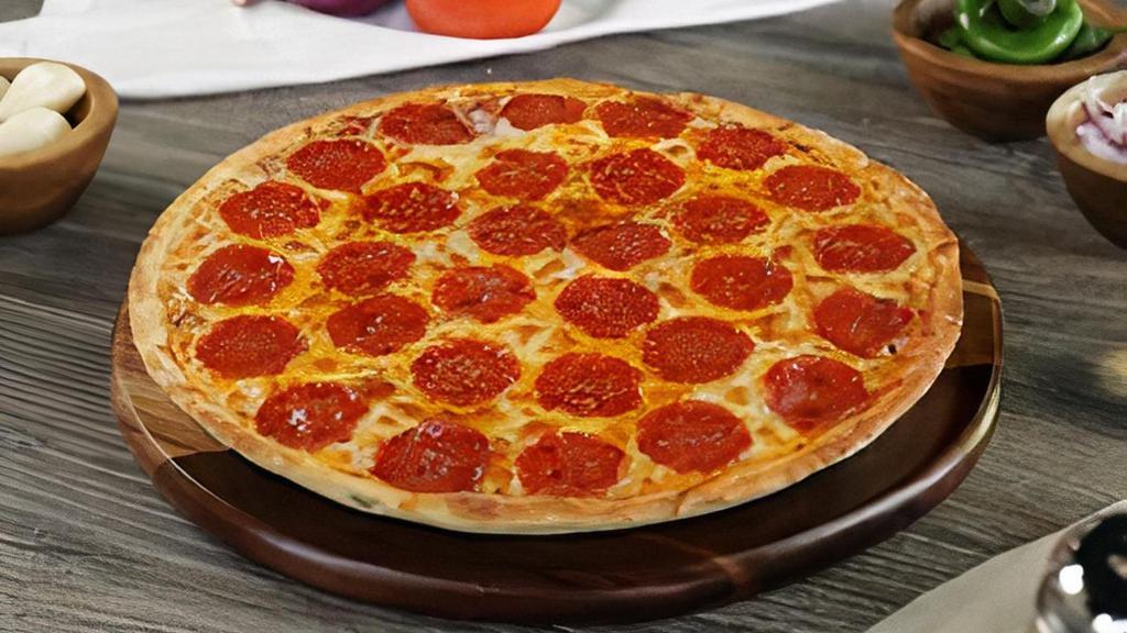 Halal Pepperoni Pizza Twist · This pizza has our signature red sauce and halal pepperoni