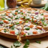 Tikka Masala Veggie Pizza Twist · This pizza has our signature tikka sauce, fresh diced mozzarella cheese, fresh mushrooms, cr...